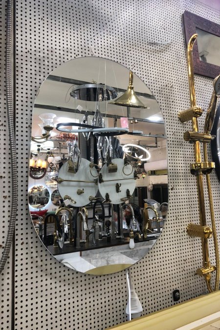 مراية حائط بيضاوية